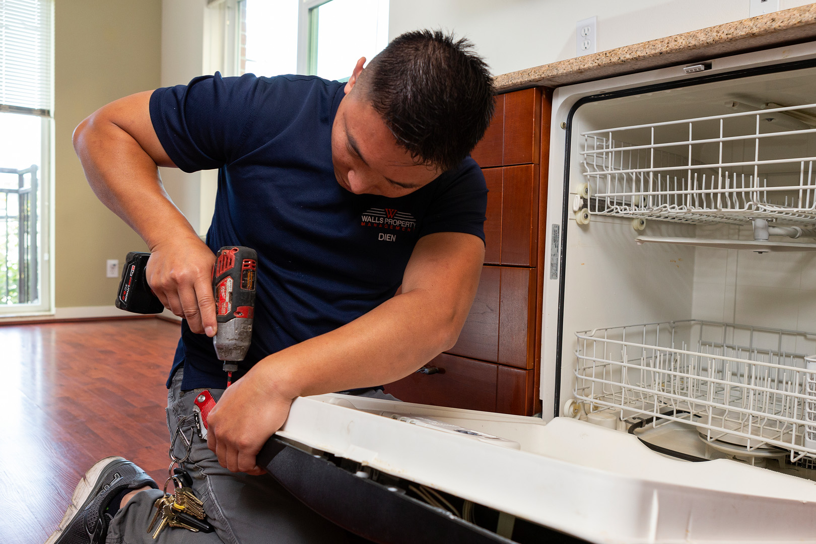 Maintenance fixing a dishwasher