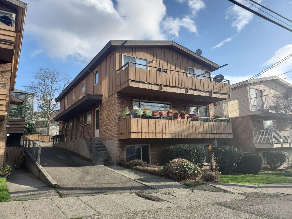 3656 Phinney Ave N property exterior three story with outside patio deck